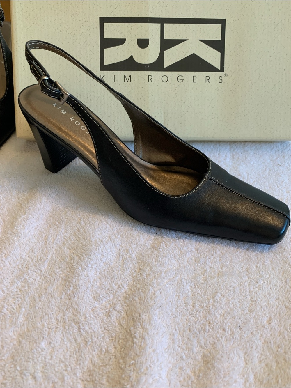 Dressy Kim Roger’s Black Leather Sling Back high heels.
